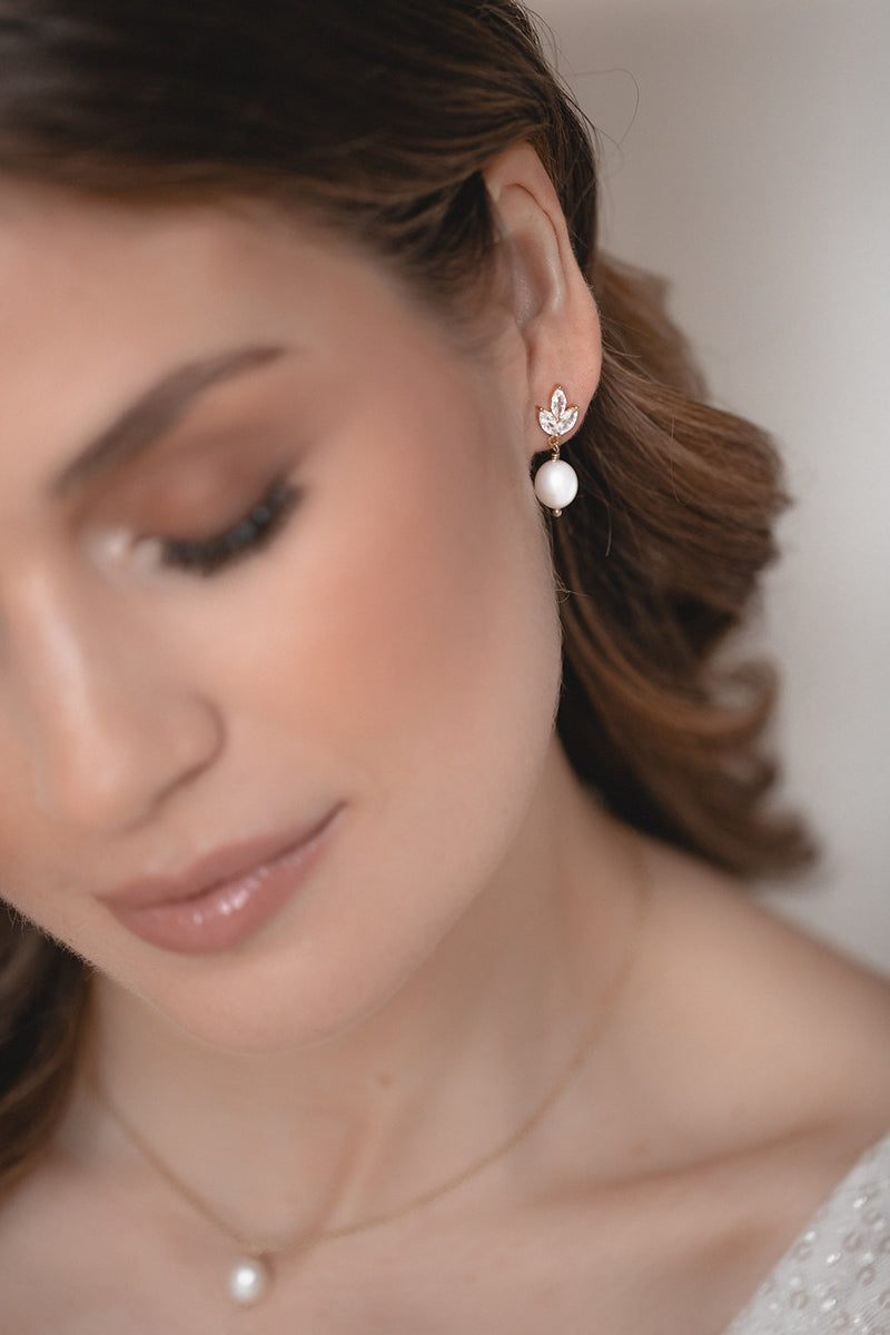 INSEPARABLE | crystal stud earrings with pearls