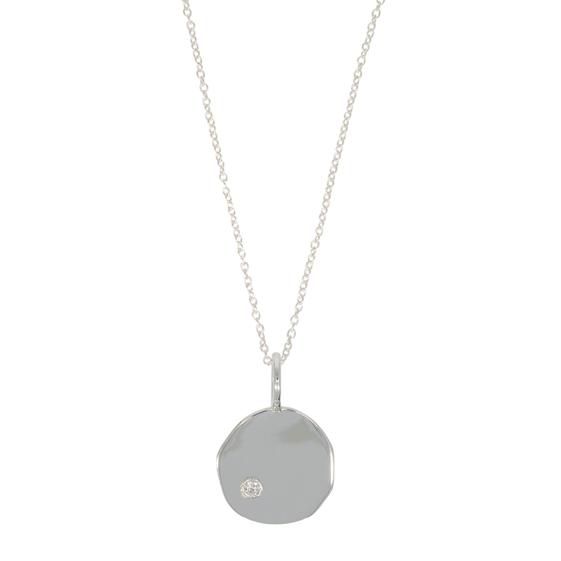 Memory | Organic pendant with a white topaz